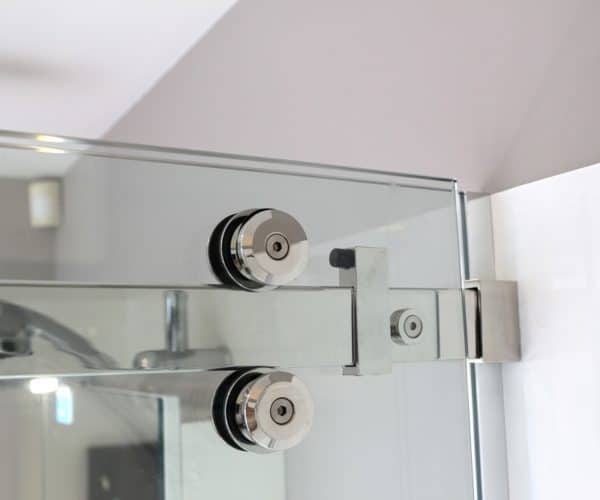 Urban shower door rail wheels closeup - Henry Brooks